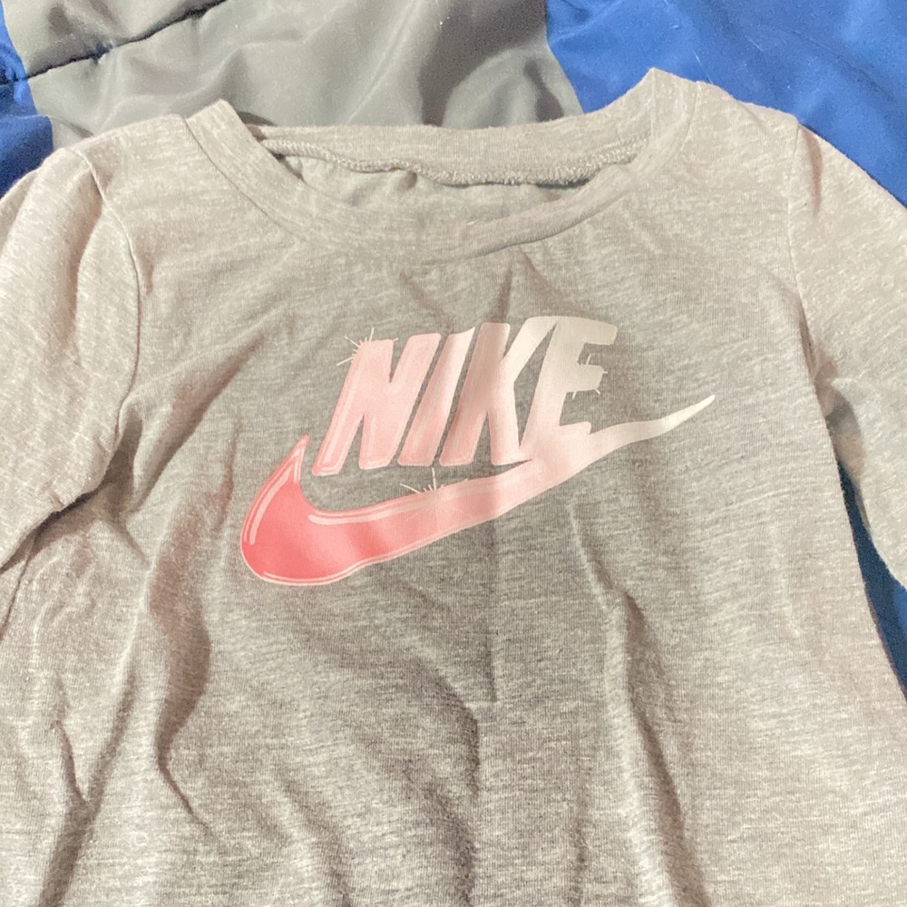 A Nike shirt $18 months